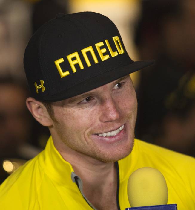Super welterweight Canelo Alvarez of Mexico smiles during an interview following his weigh-in at the MGM Grand Arena on Friday, March 07, 2014.